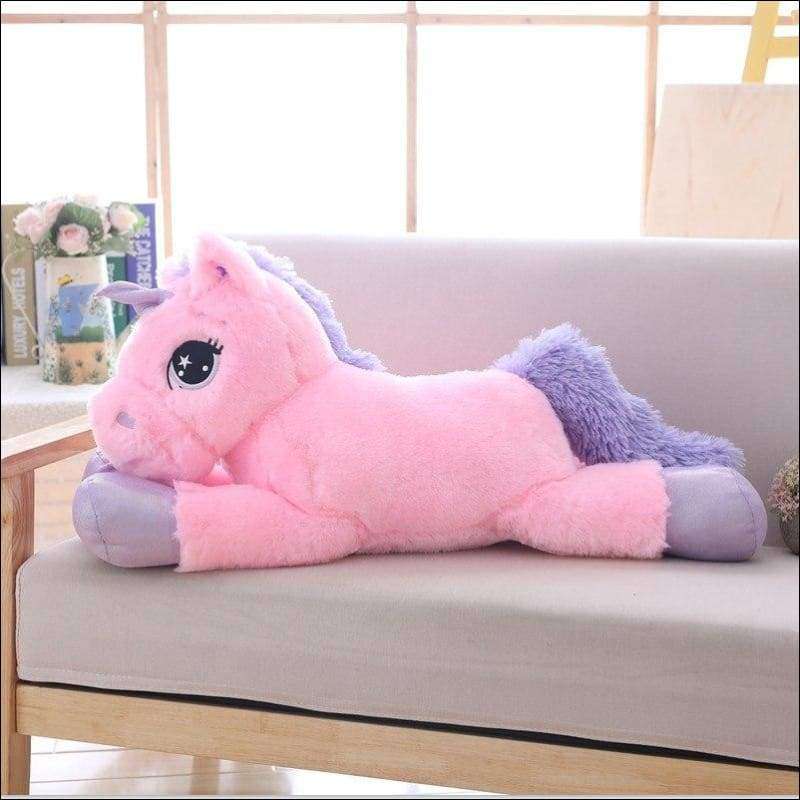 giant stuffed pink unicorn