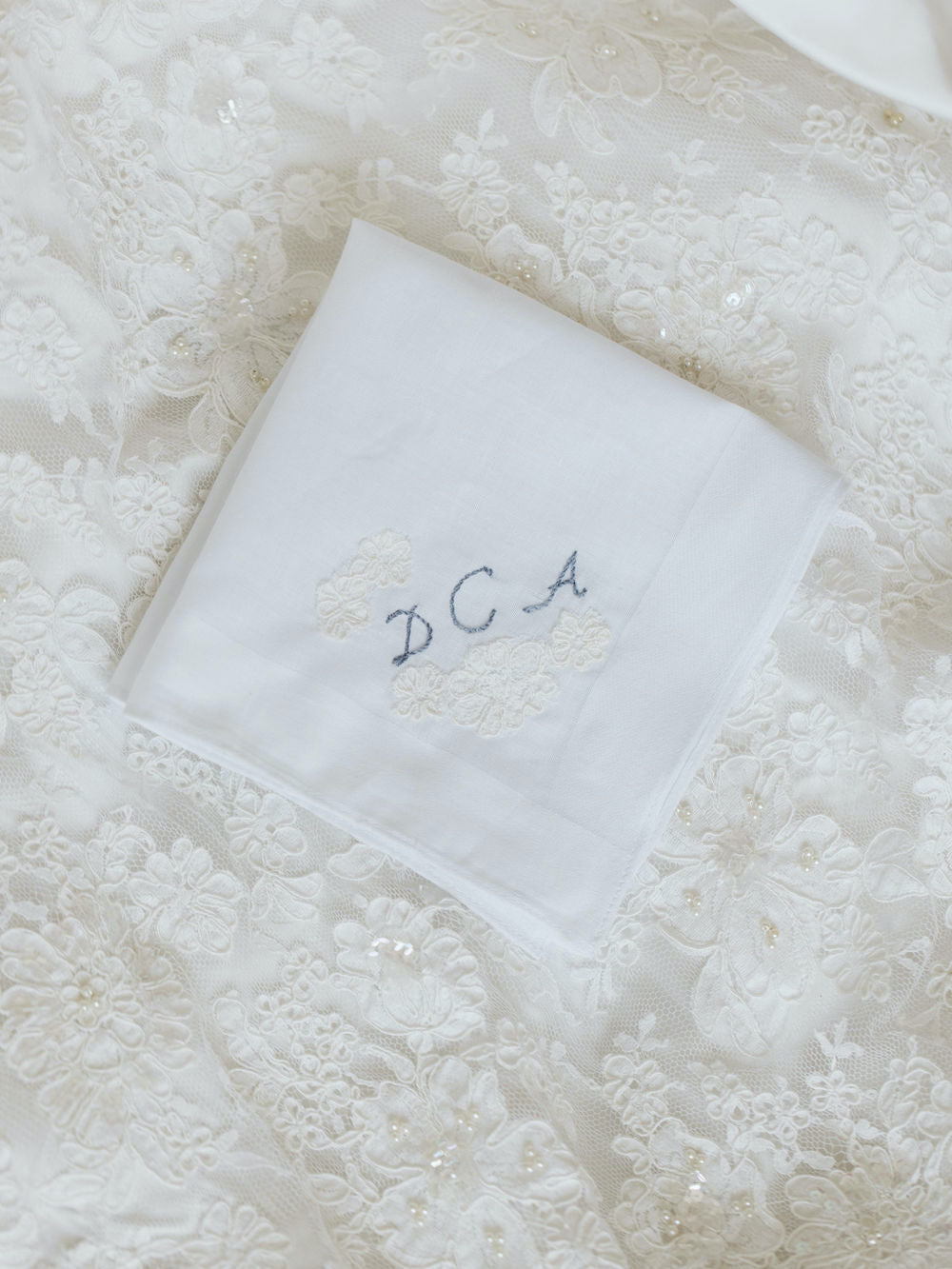 wedding handkerchief made from mother's wedding dress with embroidered monogram by expert heirloom designer The Garter Girl