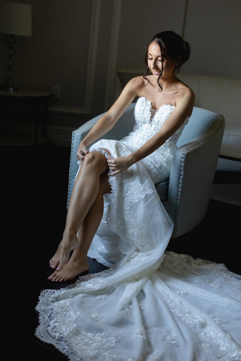 Bride Getting Ready with Her Luxury Bridal Garter by The Garter Girl