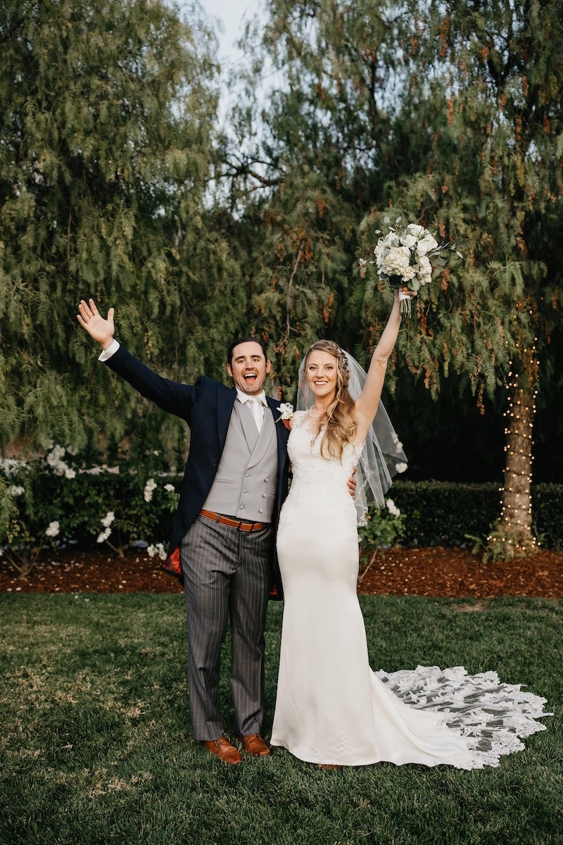 couple at outdoor California fall wedding at family home