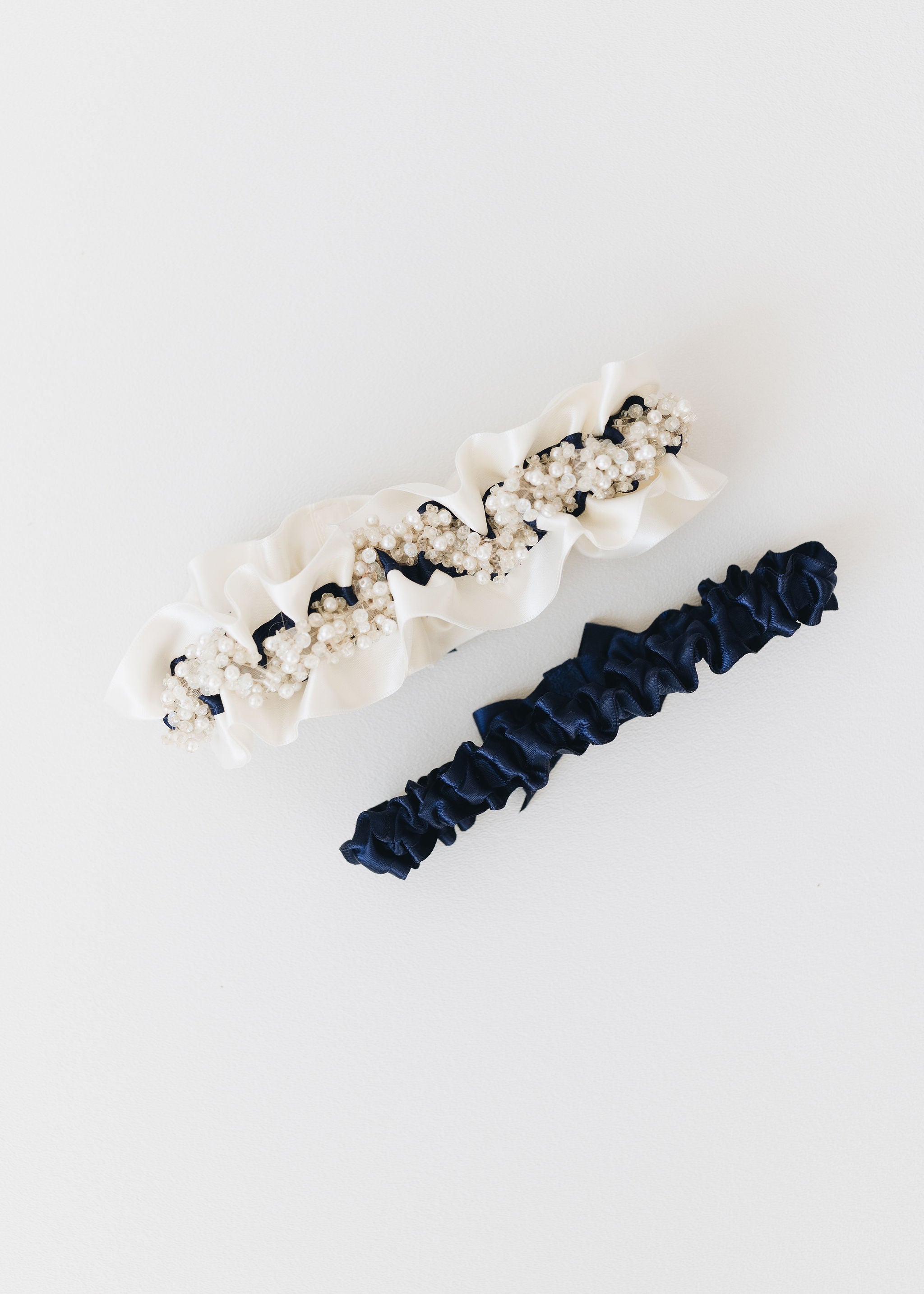 personalized wedding garter set with beads & ivory & navy blue satin by expert bridal accessory designer, The Garter Girl