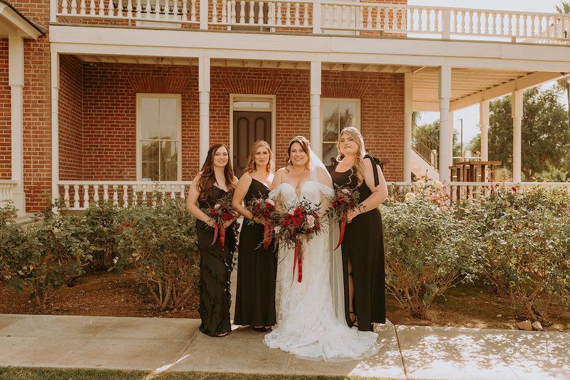 Bride and Bridesmaids in Black Bridesmaid Dresses