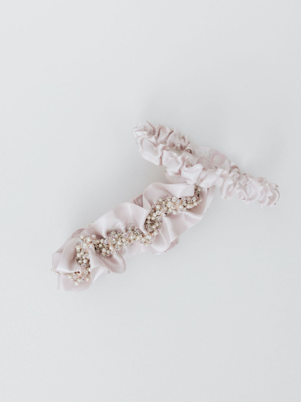 blush satin & sparkle beaded wedding garter set personalized with hand embroidery by expert bridal accessories designer, The Garter Girl