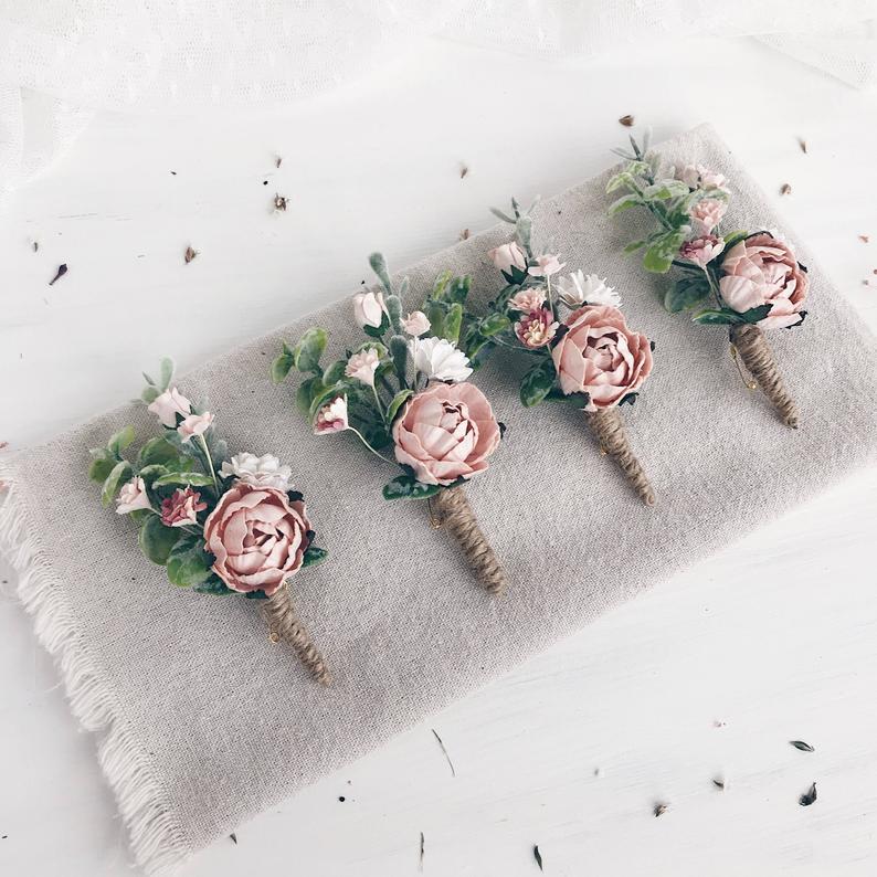 blush pink floral wedding boutonniere for the groom