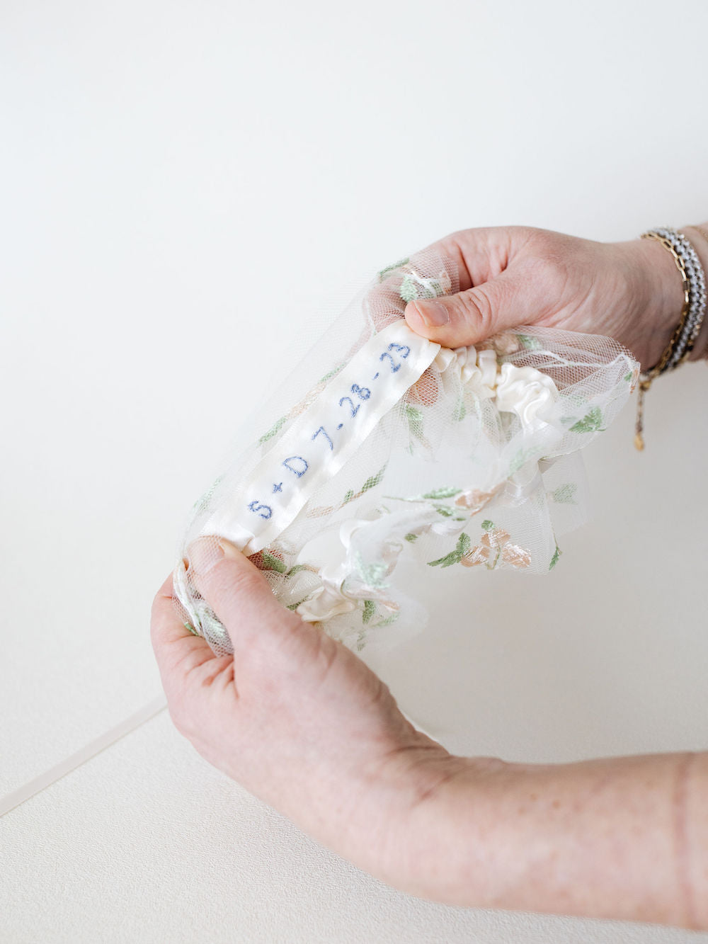 boho embroidered tulle wedding garter with flower detailing handmade by The Garter Girl