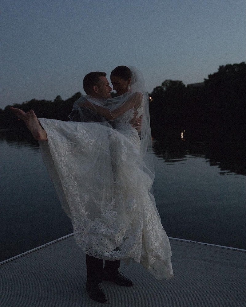 Bride and Groom on Dock at Night