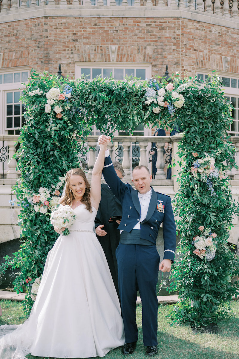 Bride and Groom Outdoor Wedding Ceremony Floral Arch
