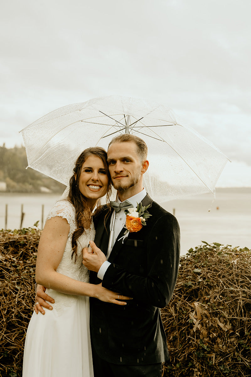 Bride and Groom Outdoor Wedding Photo with Clear Umbrella