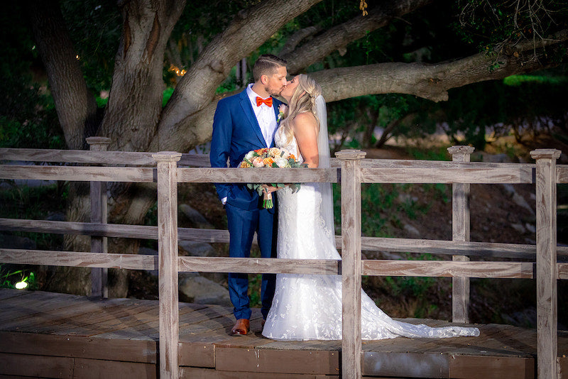 Bride and Groom Kissing Outdoor Bridal Portraits