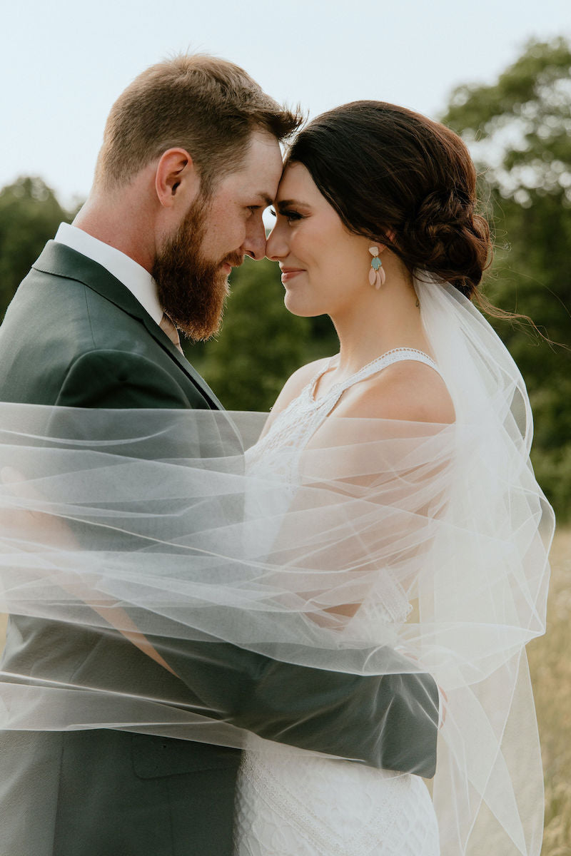 Bride and Groom Tulle Veil Outdoors