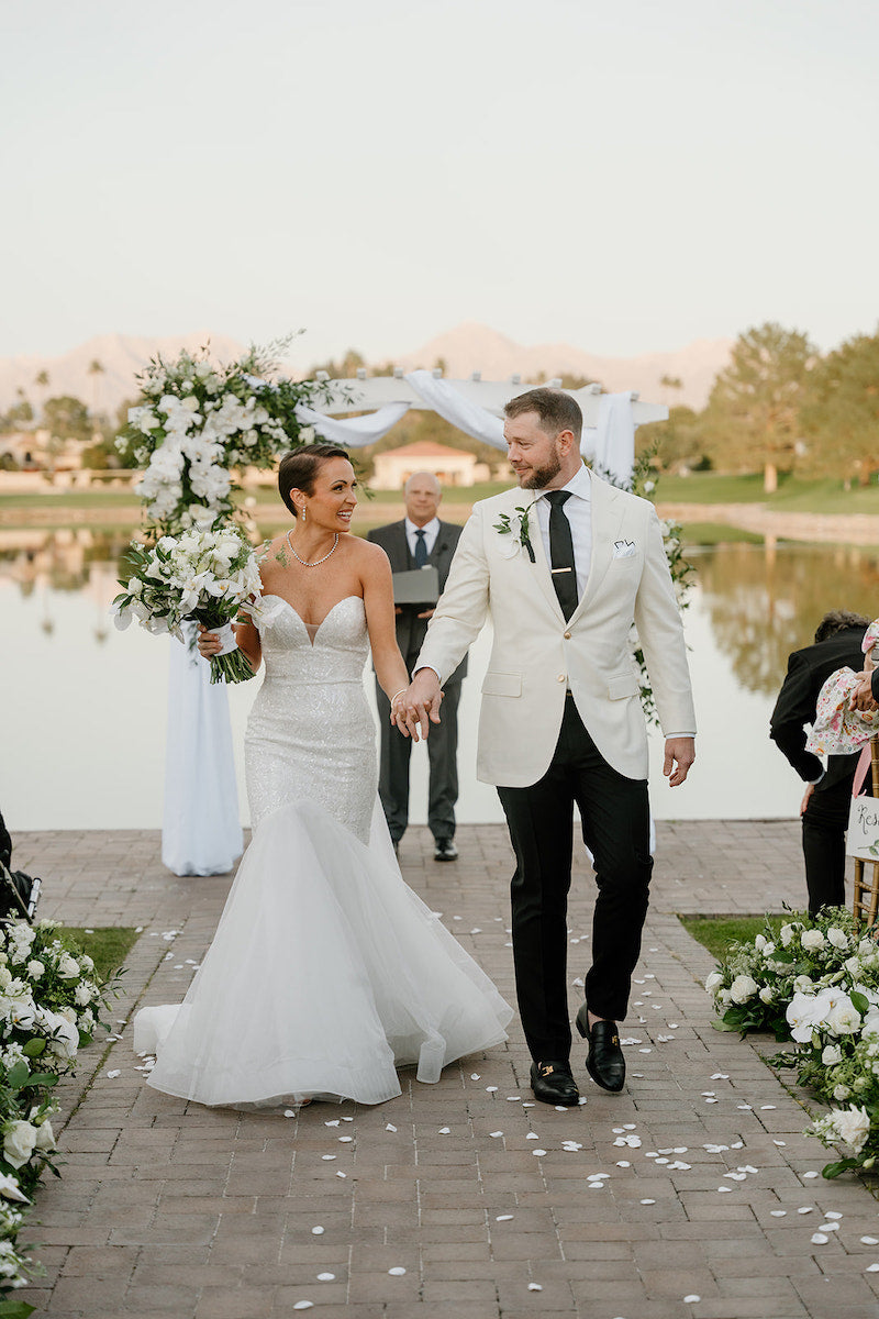 Bride and Groom Walking Down Ceremony Aisle