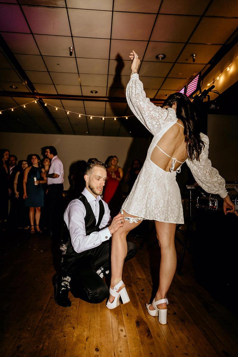 Bride With Fun Reception Dress and Bridal Garter