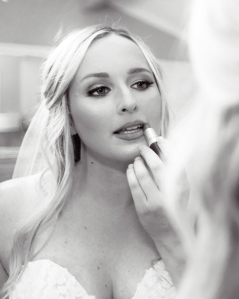 Bride Getting Ready Applying Lipstick