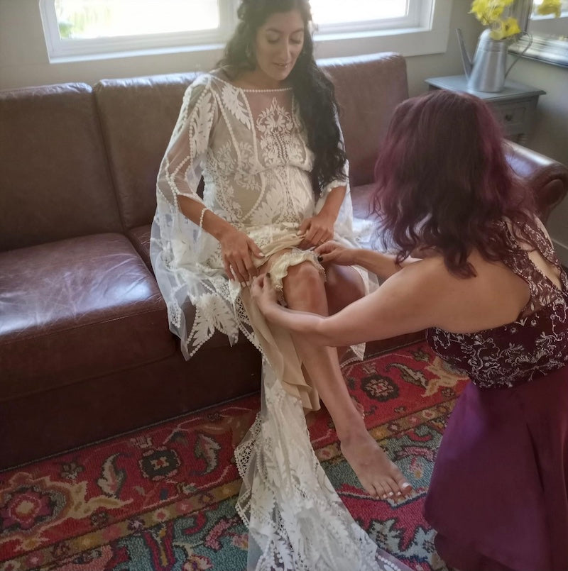 Bride Putting On Her Bridal Garter