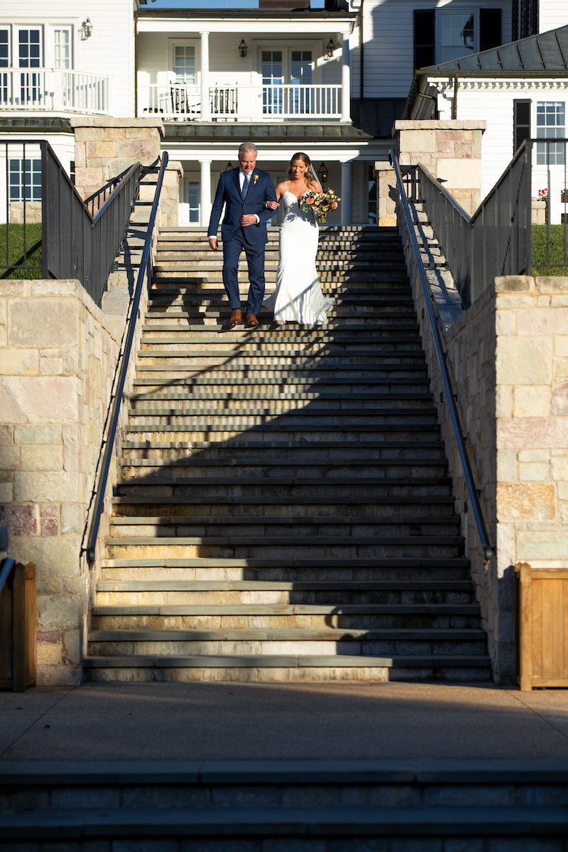 Bride and Father Walking Down Aisle Stairs