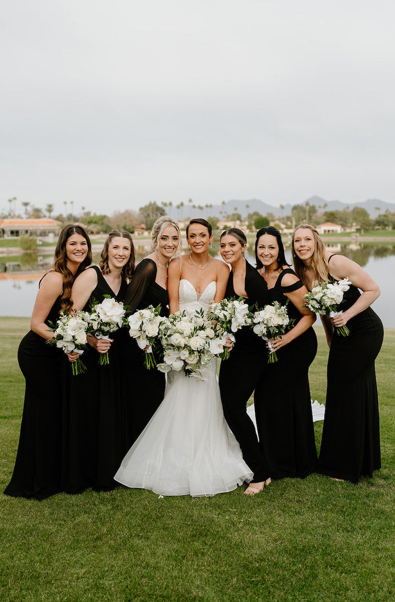 Bride with Bridesmaids in Black Dresses