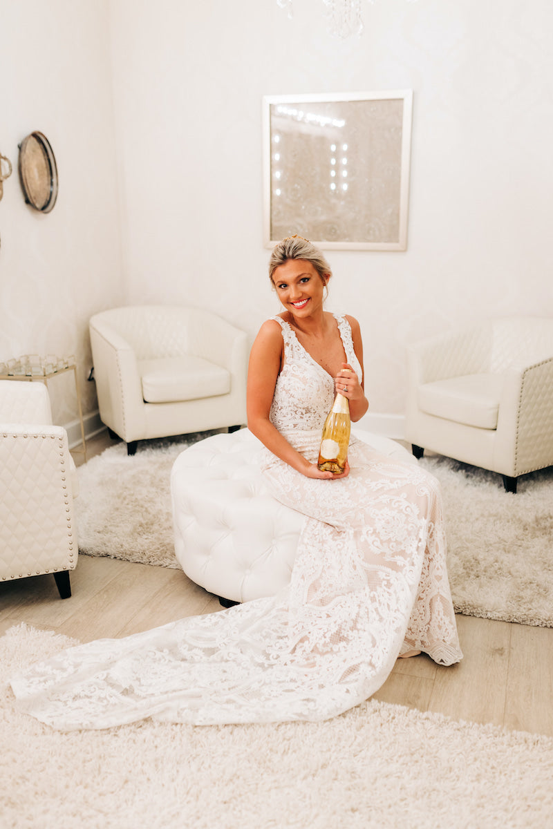 Bride with Champagne in Bridal Suite