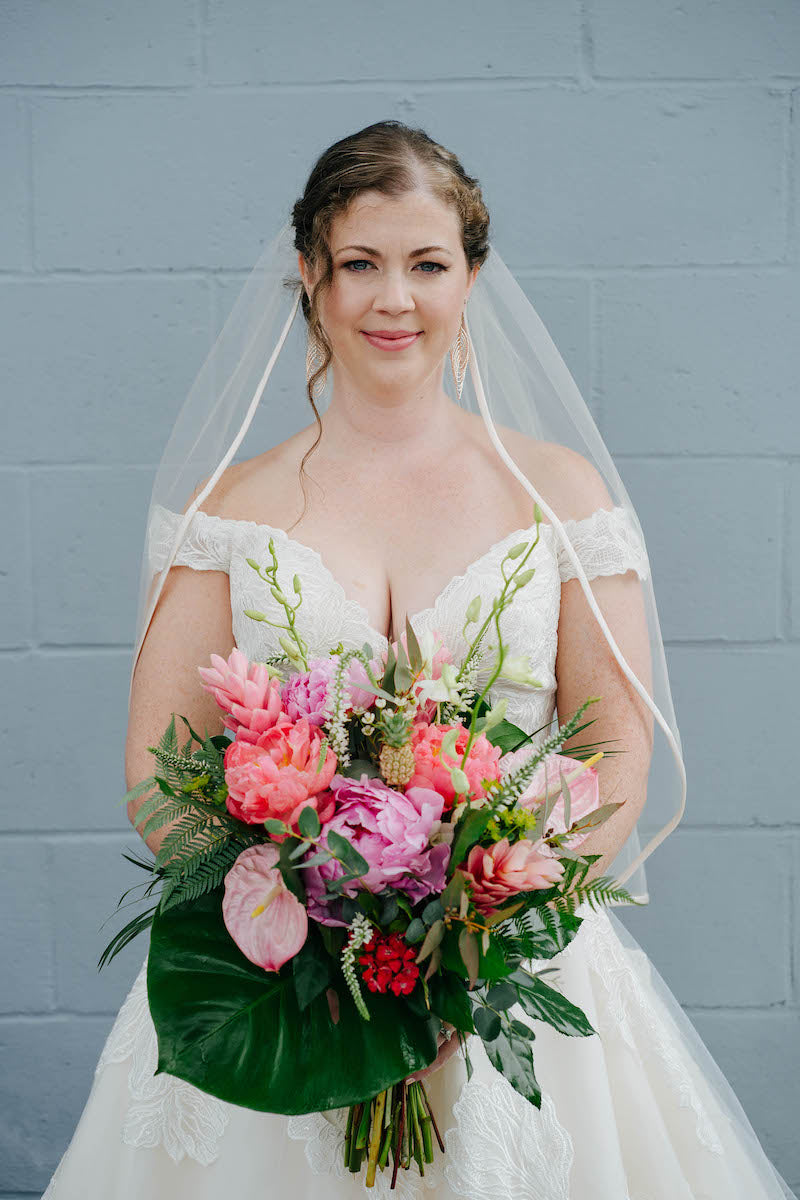 Bride with Tropical Leaf Bridal Bouquet