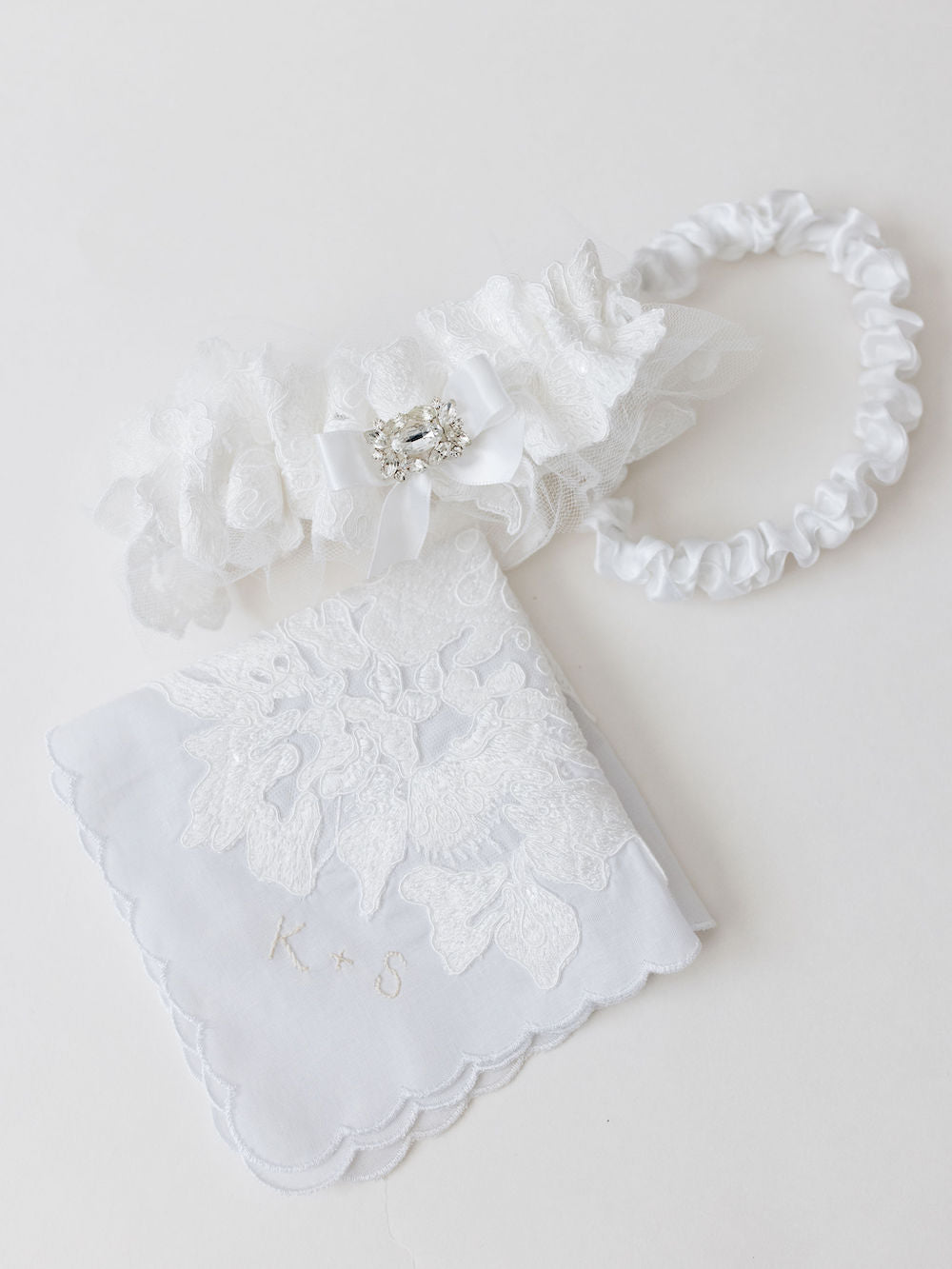 custom wedding garter set and lace handkerchief heirlooms with sparkle and tulle material from bride's wedding dress handmade by The Garter Girl