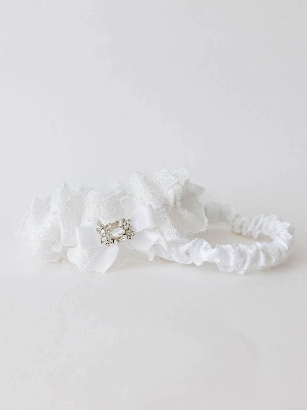 custom wedding garter set heirlooms with sparkle and tulle material from bride's wedding dress handmade by The Garter Girl