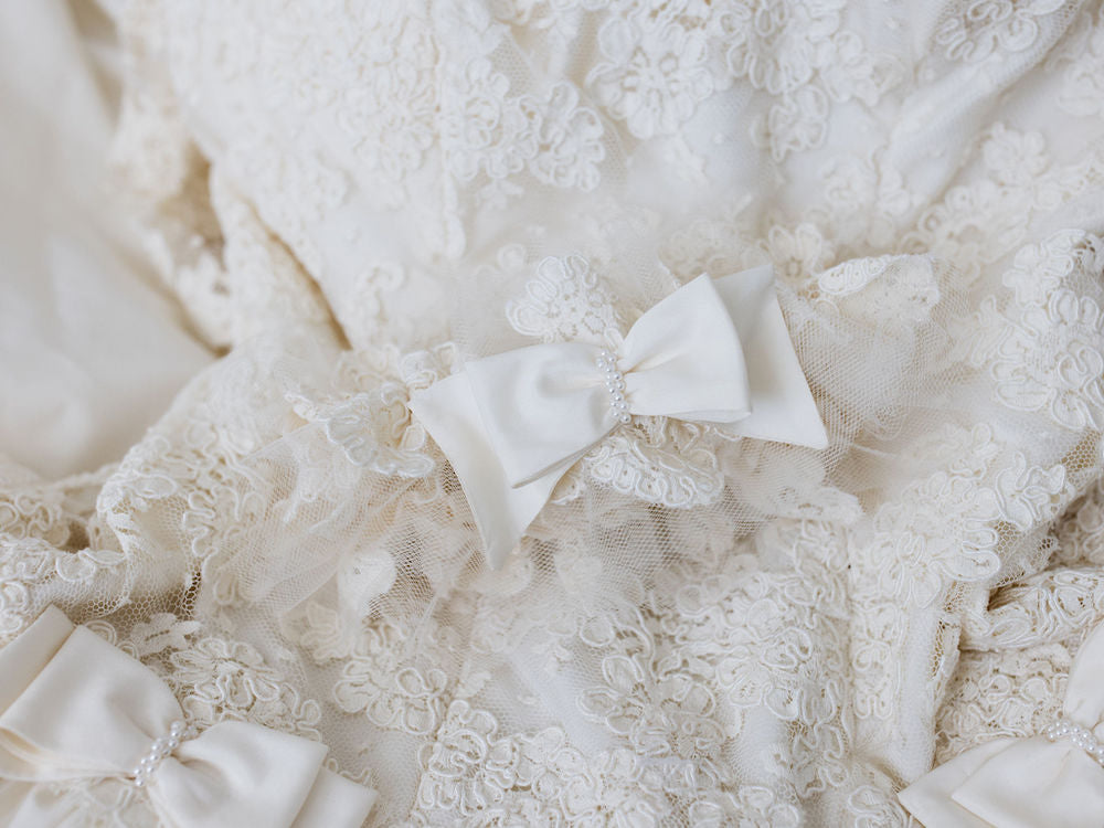 custom garter with ivory lace from grandmother's lace wedding dress and pearls by The Garter Girl