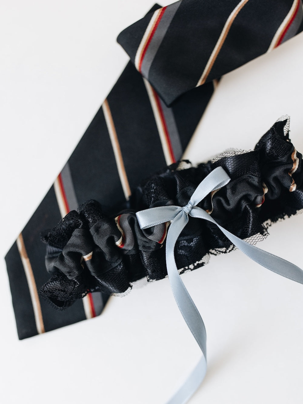 designer blue wedding garter heirloom with dark blue lace handmade from dad's necktie handmade by The Garter Girl