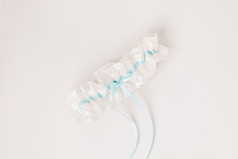 custom wedding garters for sisters made from their mother's wedding dress lace