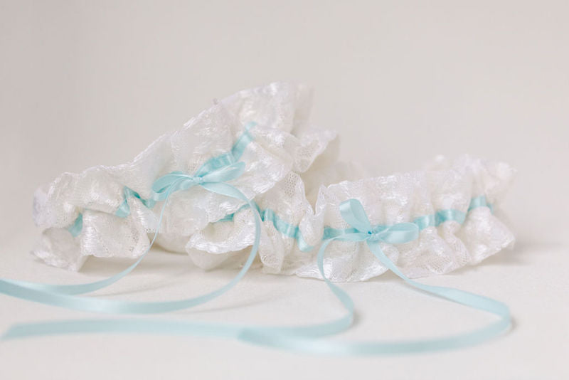 custom wedding garters for sisters made from their mother's wedding dress lace