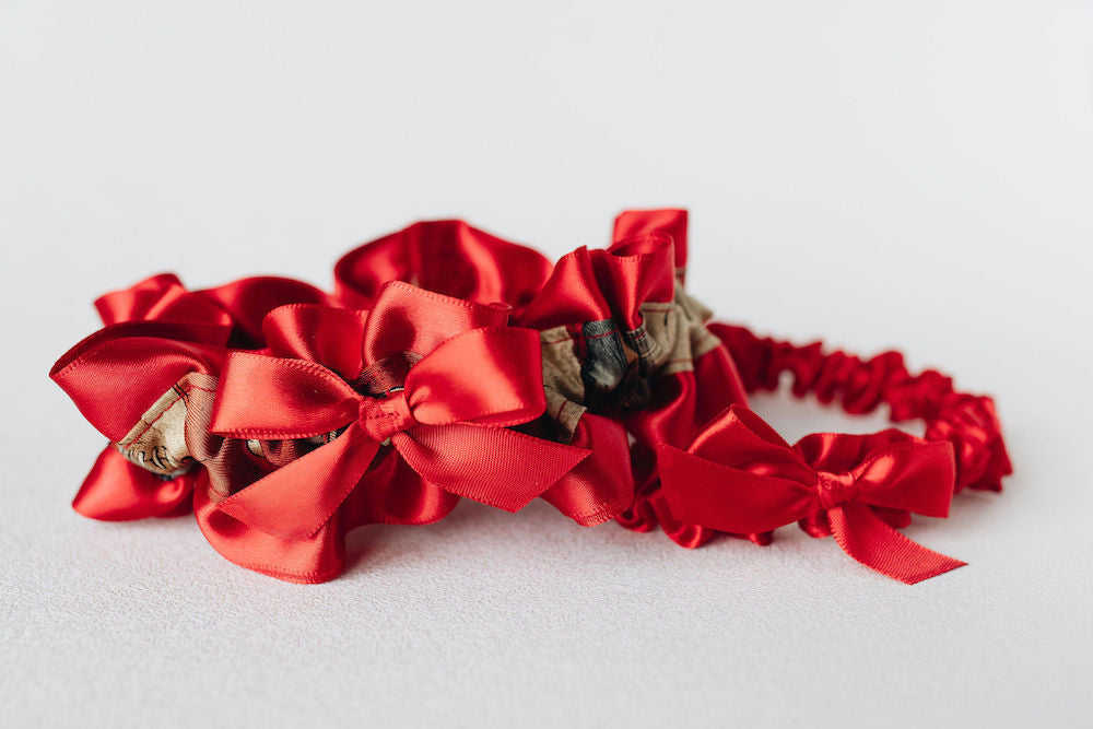 custom red satin heirloom wedding garter set with main and tossing garter handmade from fathers tie by The Garter Girl