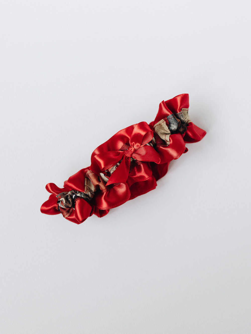 beautiful red satin main tossing garter from wedding garter set from dad's tie handmade by The Garter Girl