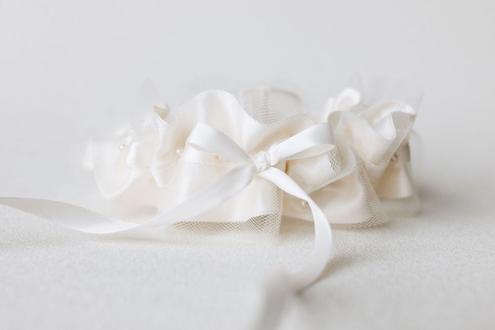 custom ivory tulle wedding garter heirloom with personalized embroidery handmade by The Garter Girl