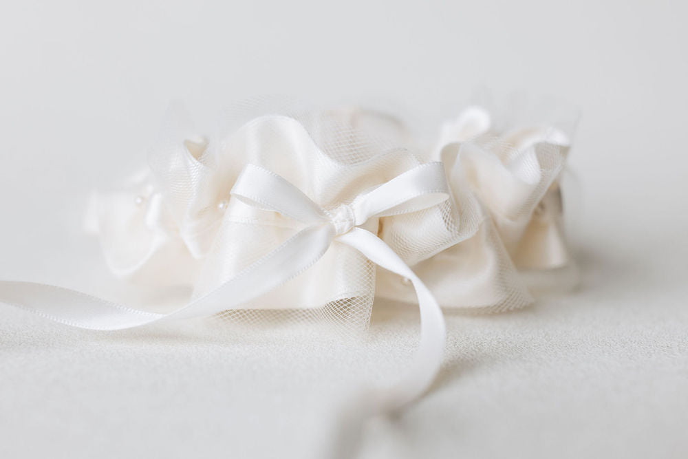 custom ivory tulle wedding garter heirloom with personalized embroidery handmade by The Garter Girl