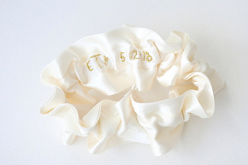 custom wedding garter with gold embroidery on inside