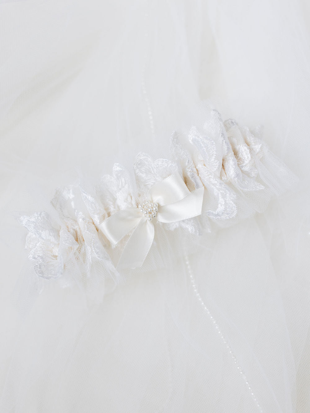 custom ivory tulle wedding garter heirloom with pearls made from mother's wedding veil handmade by The Garter Girl