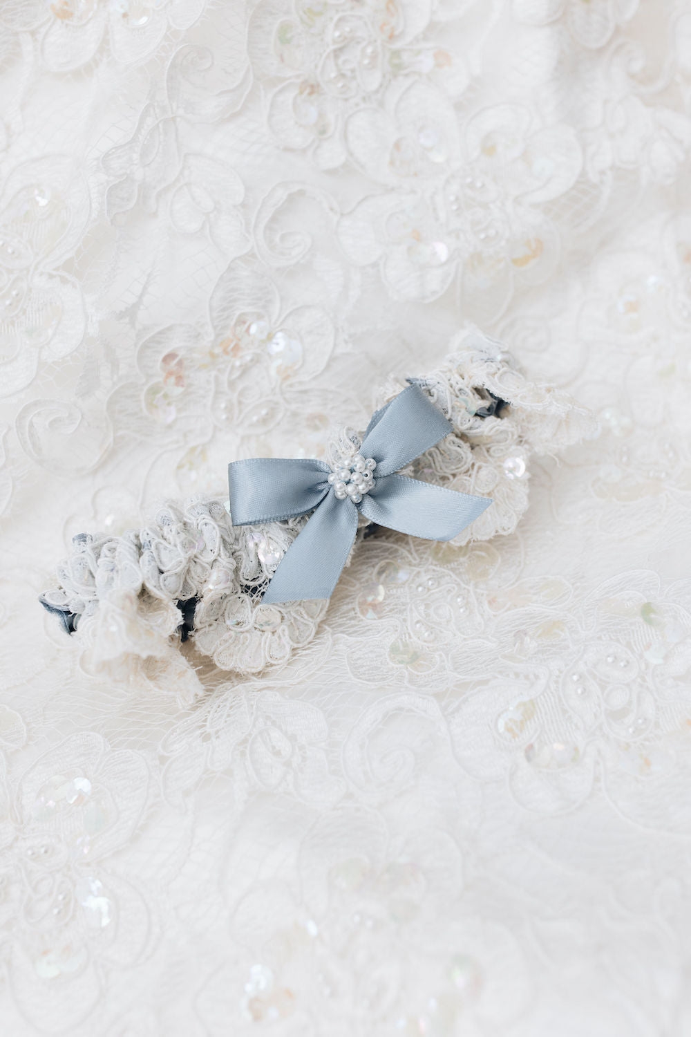 wedding garter set with ivory lace, blue satin & bow, and pearls with personalized embroidery - a handmade wedding heirloom by The Garter Girl