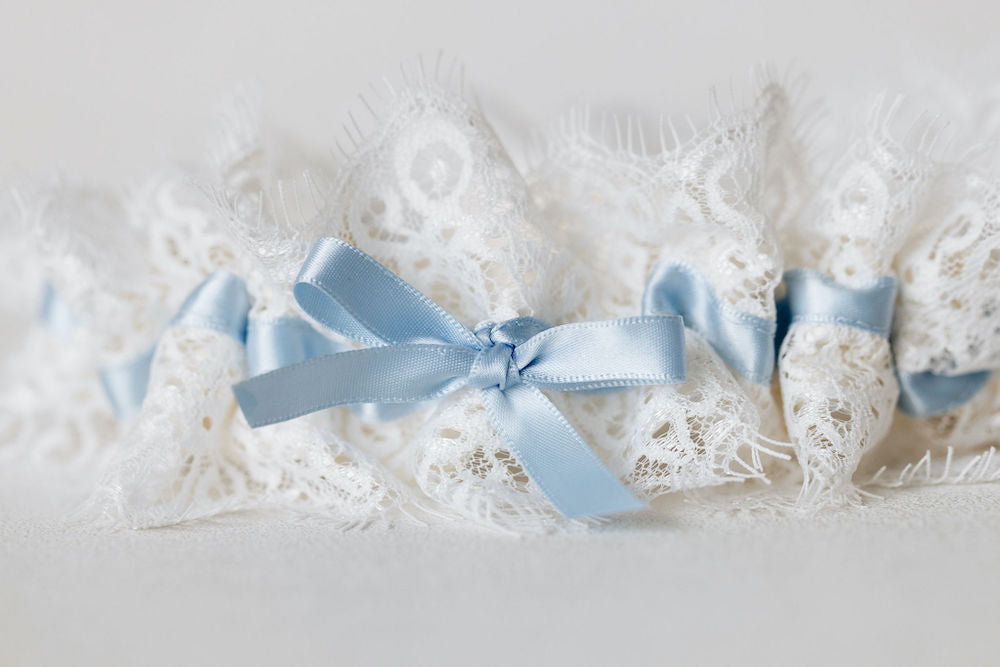 feminine eyelash lace and light blue satin wedding garter set personalized with hand embroidery by expert bridal accessory designer, The Garter Girl