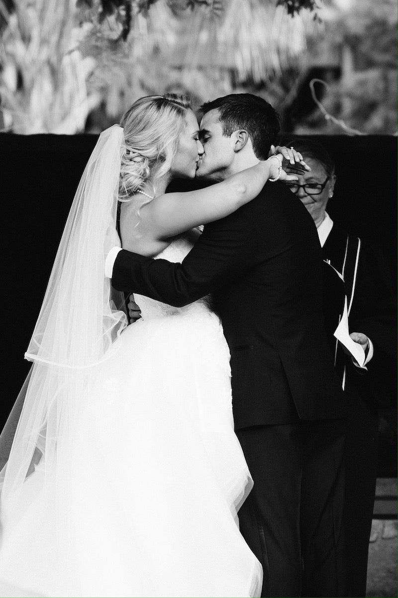 Bride and Groom First Kiss