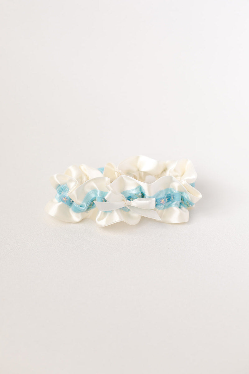 custom garter with blue velvet with flowers and sparkle