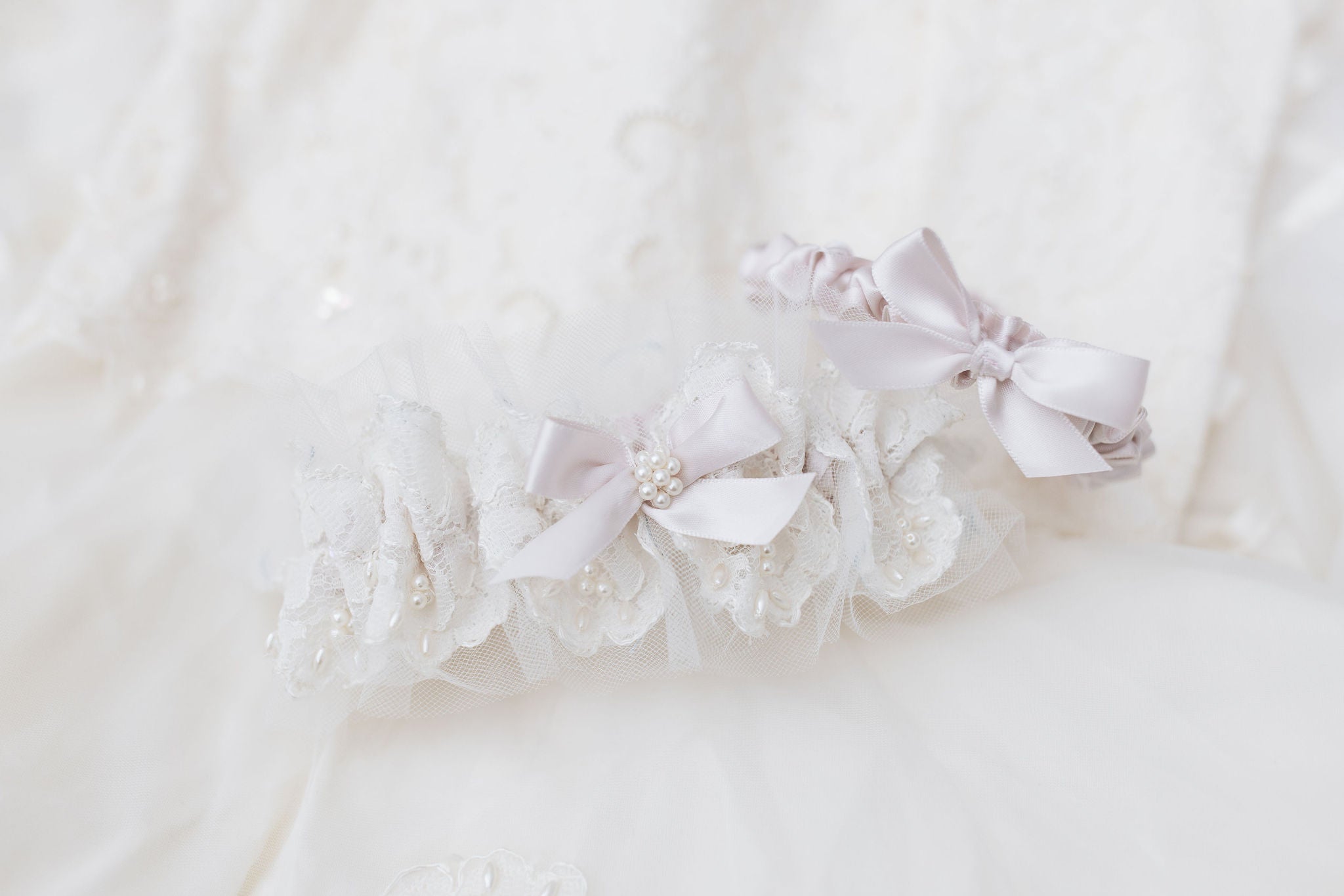 wedding garter set made from mothers wedding dress with pearls, lace, blush accents and personalized embroidery - a handmade wedding heirloom by The Garter Girl