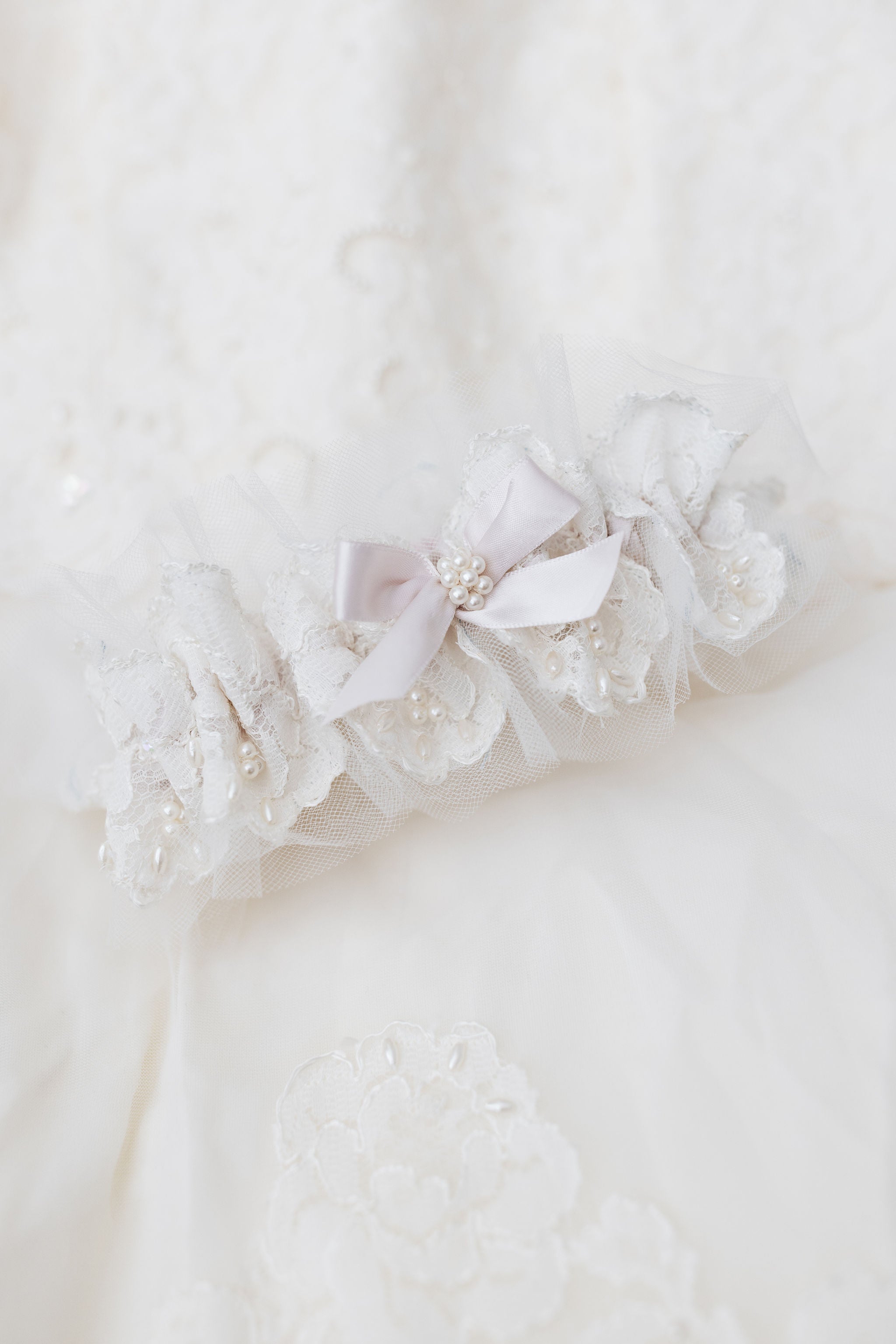 wedding garter set made from mothers wedding dress with pearls, lace, blush accents and personalized embroidery - a handmade wedding heirloom by The Garter Girl
