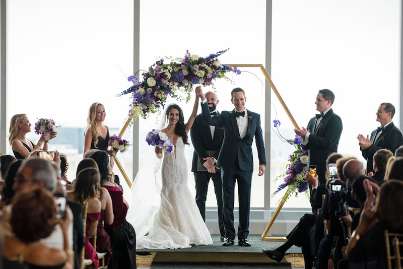 Gold Geometric Wedding Arch Bride and Groom