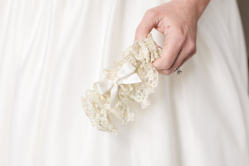 custom heirloom garter with gold lace and ivory satin