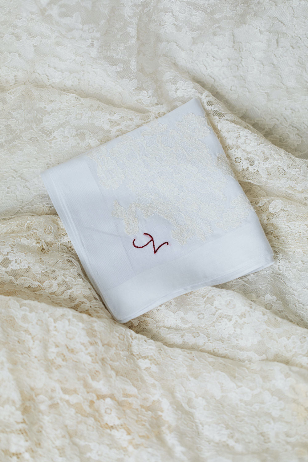 using great grandmother's wedding dress lace on two wedding handkerchiefs personalized with monogram embroidery - handmade wedding heirlooms from The Garter Girl