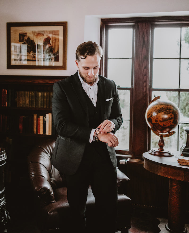 Groom Getting Ready in Library Room