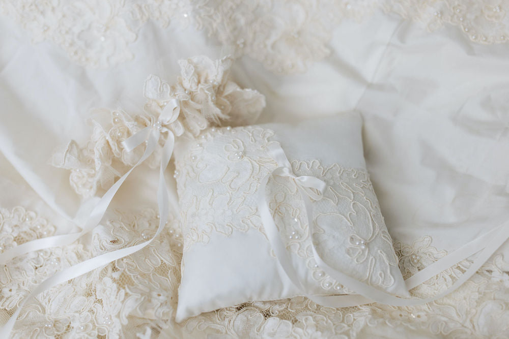 ring pillow and wedding garter heirlooms with lace and pearls from mom's wedding dress handmade by The Garter Girl