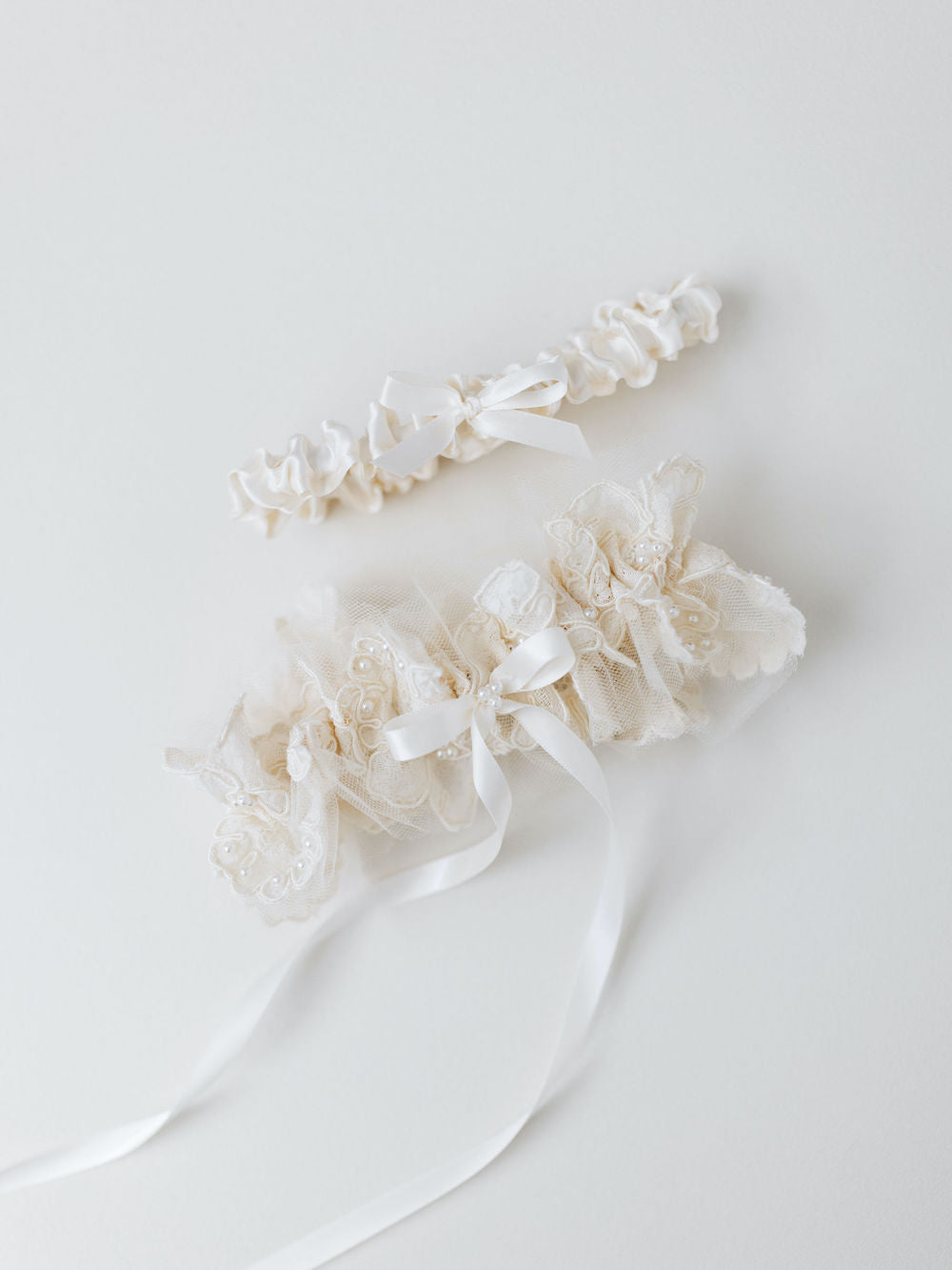 wedding garter set with tossing garter heirloom from lace and pearls of mom's wedding dress handmade by The Garter Girl