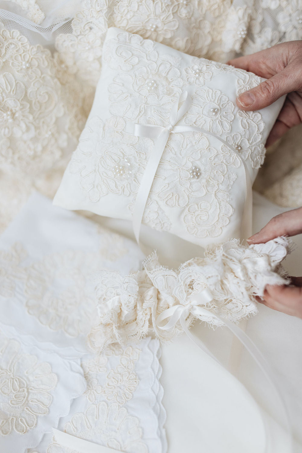 ivory wedding heirlooms including ring bearer pillow, handkerchief, & wedding garter made with lace from mom's wedding dress handmade by The Garter Girl