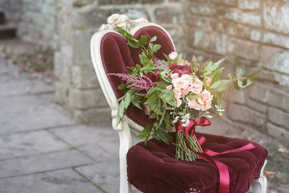 elegant bridal bouquet - tips for changing or postponing wedding date from The Garter Girl