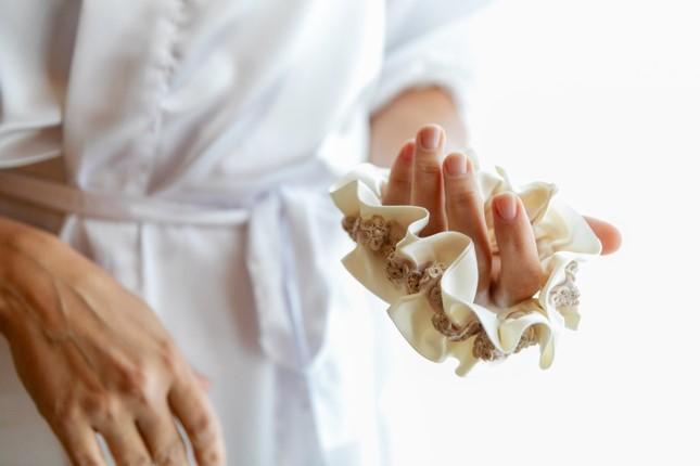 Ivory and Blush Wedding Garter in Bride's Hand Elopement Garter