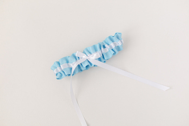 modern wedding garter with something blue and white